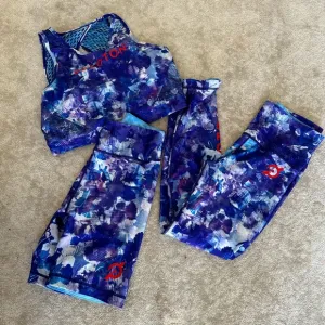 3 pc Peloton WITH blue printed Leggings, Bra, and biker shorts